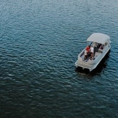 a small boat in a large body of water
