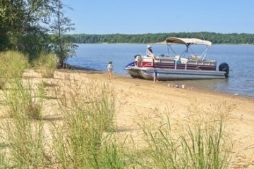 a small boat in a body of water